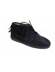 Botas con flecos mohicanas...